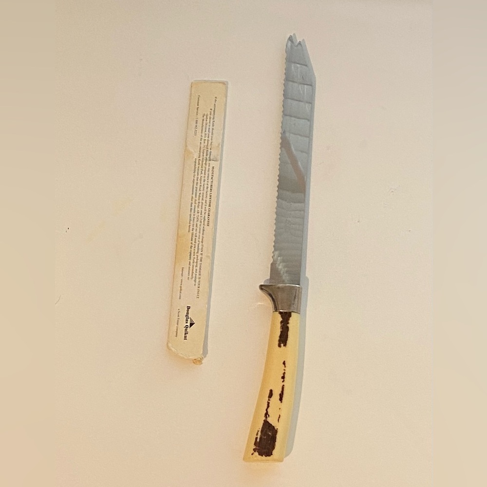Sheffield England    Serrated Carving Knife with Cream and Brown Handle
